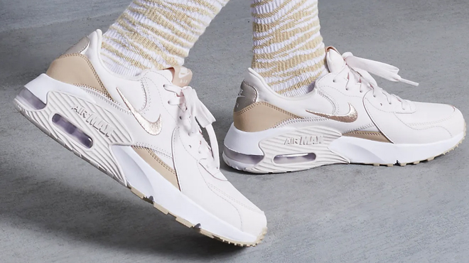 A Person Wearing Nike Air Max Excee Shoes