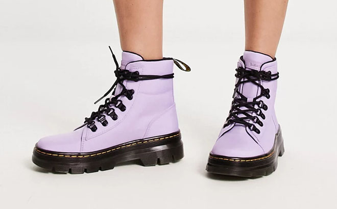 A Person Wearing a Dr Martens Womens Combs Nylon Boots
