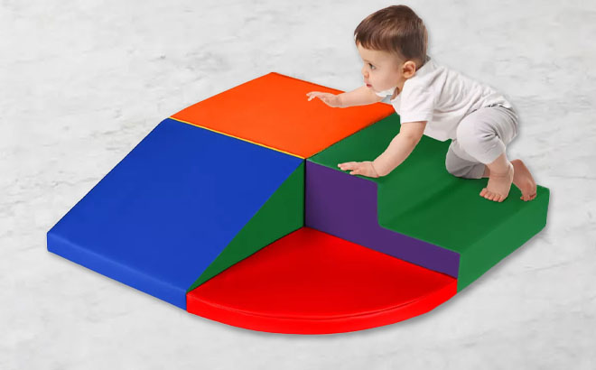 A Toddler Playing a Climb Crawl Soft Foam Shapes Structure Playset