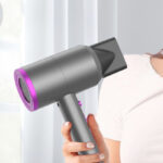 A Woman Holding a Slopehill Professional Ionic Hair Dryer