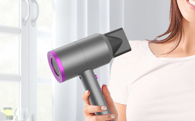 A Woman Holding a Slopehill Professional Ionic Hair Dryer