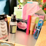 Amazon Delivery Box with Ardell False Eyelashes COSRX Face Serum and Other Products