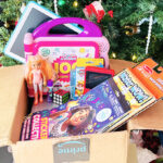 An Amazon Delivery Box Full of Stocking Stuffers for Kids