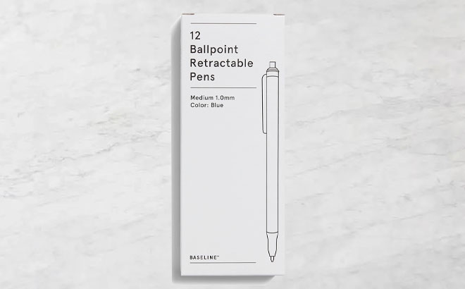Baseline Retractable Ballpoint Pens 12 Pack on a Cement Table