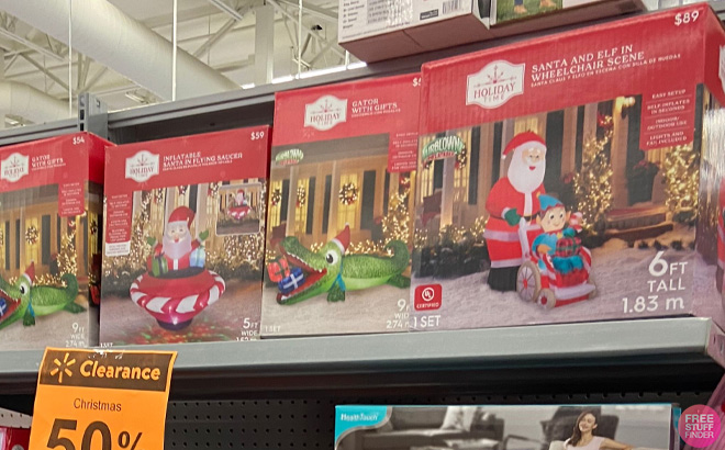 Boxes of Christmas Inflatables on Shelf at Walmart