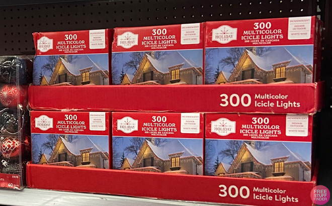 Boxes of Holiday Time 300 Count Blue Icicle Lights on Shelf at Walmart