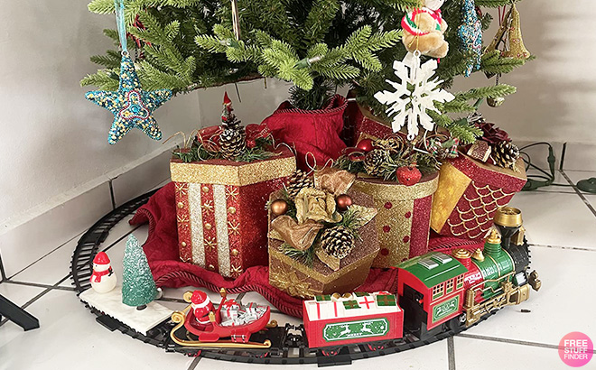 Christmas Tree with Santa Train Set and Holiday Gifts Under the Tree