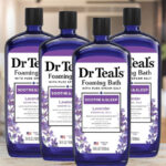 Four Bottles of Dr Teals Lavander Foaming Bath on Desk
