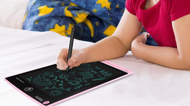 Girl Drawing on the LCD Writing Tablet in Pink Color