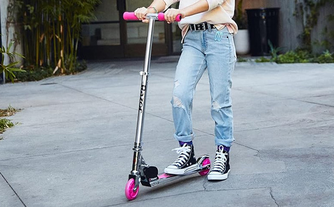 Girl Riding Pink Kick Scooter