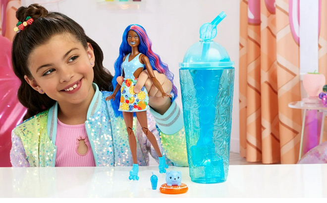 Girl is Playing with Barbie Pop Reveal Fruit Series Fruit Punch Doll