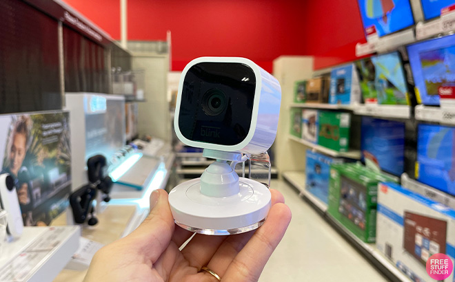 Blink Mini Camera Hand Holding Amazon Blink Mini 1080p Security Camera in Store