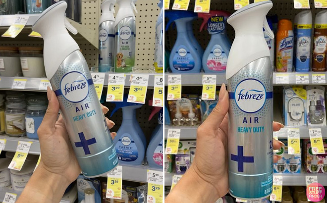 Hand Holding Febreze Air Freshener Spray Heavy Duty