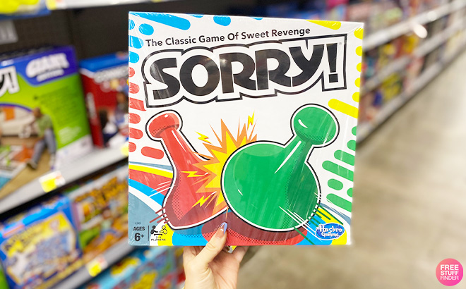 Hand Holding Hasbro Classic Sorry Board Game