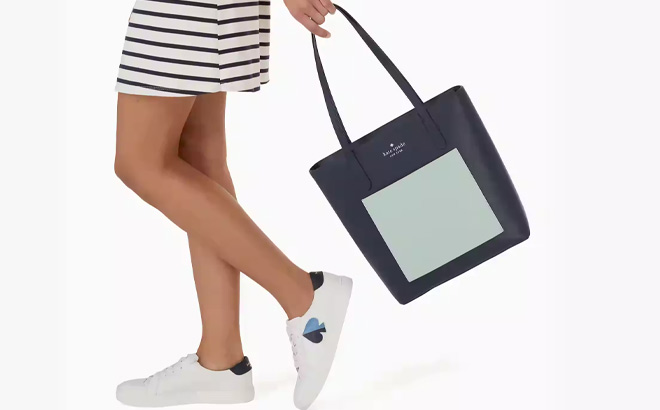 Hand Holding Kate Spade Daily Tote in Blazer Blue Multi Color