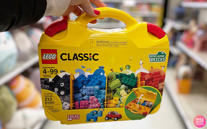 Hand Holding LEGO Classic Creative Suitcase