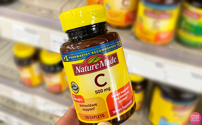 Hand Holding Nature Made Vitamin C 500 mg Hand Holding Nature Made Vitamin C 500 mg