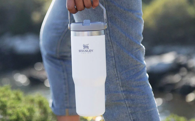 Hand Holding Stanley IceFlow Flip Straw Tumbler Hand Holding Stanley IceFlow Flip Straw Tumbler