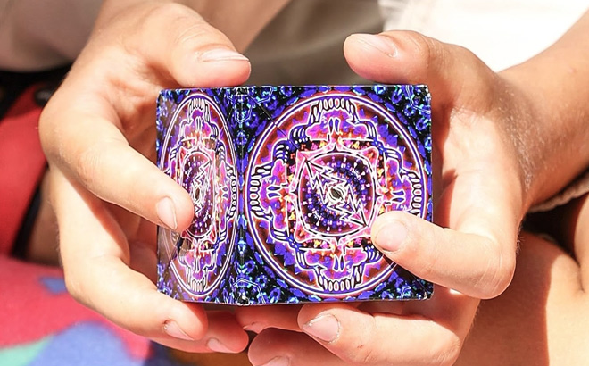 Hands Holding a Shashibo Shape Shifting Box