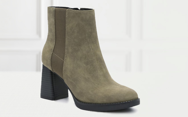 Kelly Katie Macee Bootie in olive Green Color on the Table