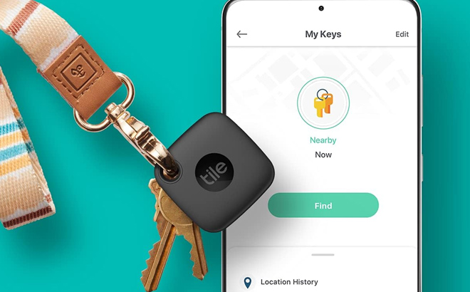 Keys Attached to a Tile Bluetooth Tracker Placed on Top of a Phone