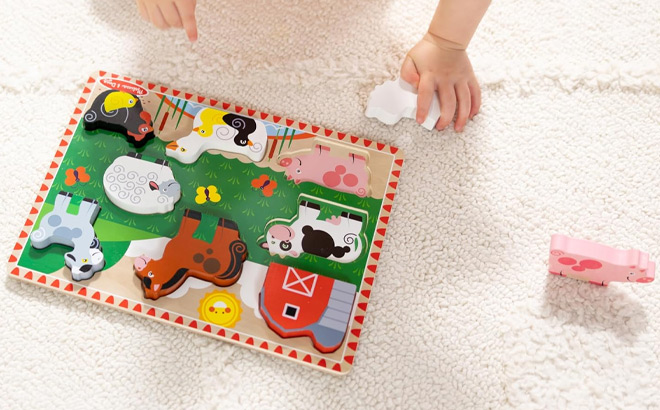 Kid Playing with Melissa Doug Farm Wooden Chunky 8 Piece Puzzle Set