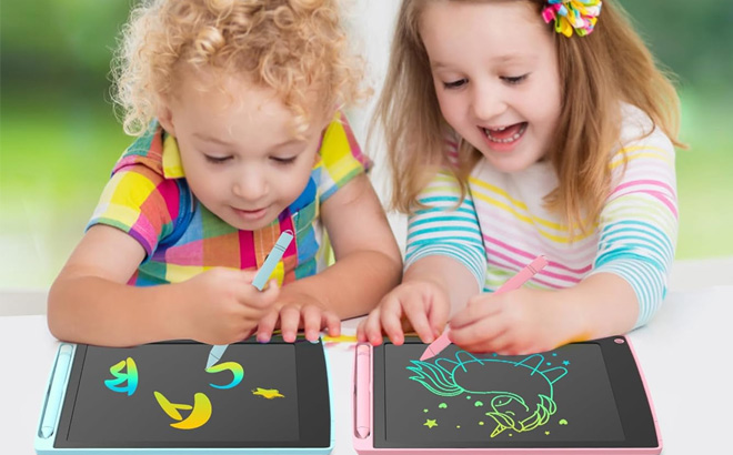 Kids Playing With Writing Tablet