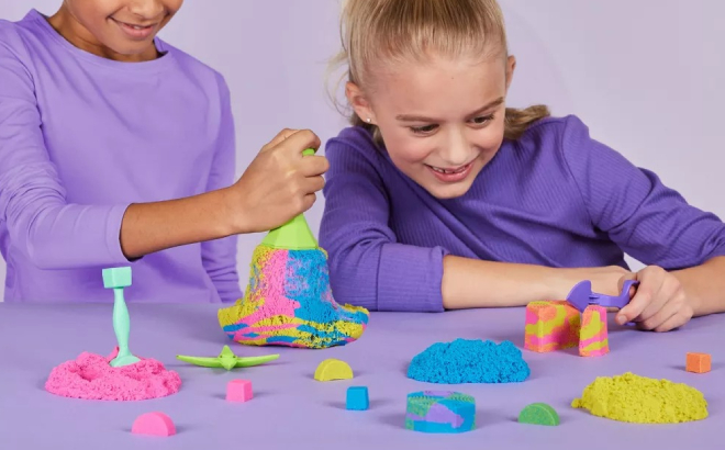 Kids Playing with Kinetic Sand Squish N Create Playset