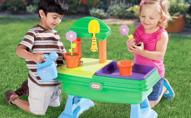 Kids Playing with Little Tikes Flower Garden Table Set