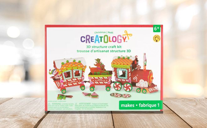 Light Up Train Christmas 3D Structure Craft Kit by Creatology on a Table