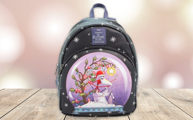 Loungefly The Nightmare Before Christmas Jack Snow Globe Mini Backpack on the Table