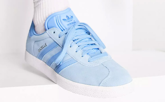 Man is Wearing Adidas Originals Gazelle Casual Shoes in Clear Blue Color