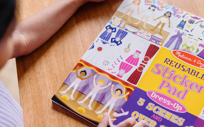 Melissa Doug Reusable Sticker Pad on the Table