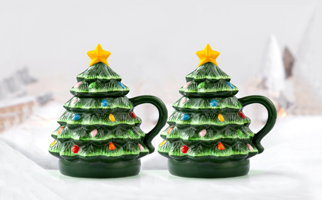 Mr Christmas Ceramic Decorative Christmas Tree Lidded Mugs on the table