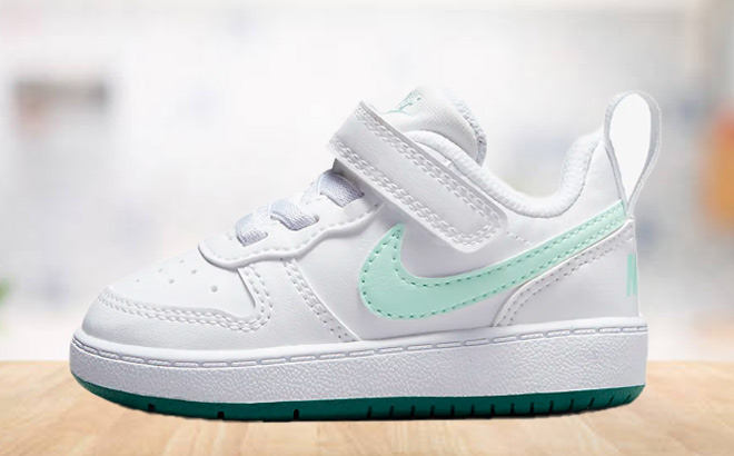 Nike Toddler White Shoes on the Desk Nike Toddler White Shoes on the Desk