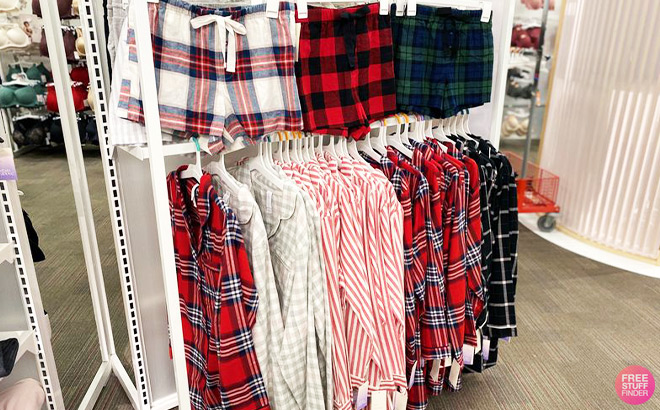 Pajama Tops and Bottoms on a Rack inside a Store