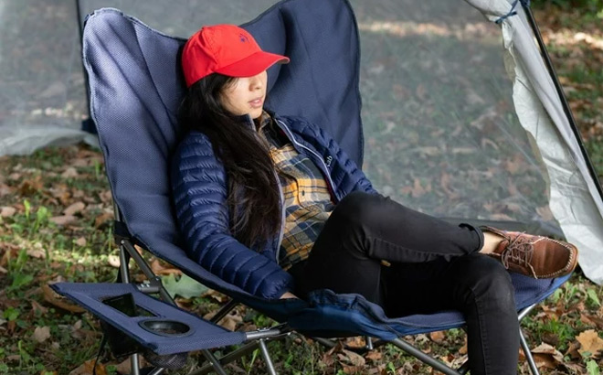 Person Sitting on Ozark Trail Relax Chair with Side Table