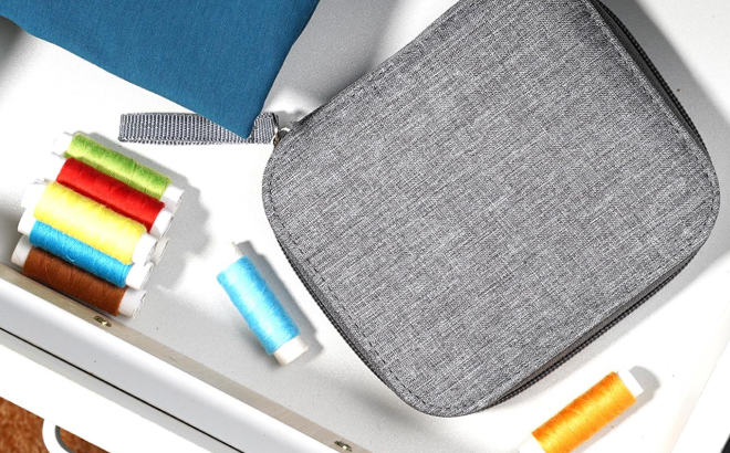 Sewing Kit Bag and Needle Threads Inside a Drawer