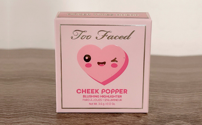 Too Faced Pinker Times Ahead Cheek Popper on a Table