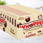 Whoppers Malted Milk Balls Candy Boxes 12 Pack on a Kitchen Countertop