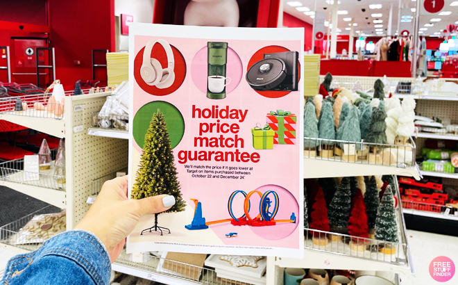 Woman Holding a Target Brochure with Holiday Price Match Guarantee Details