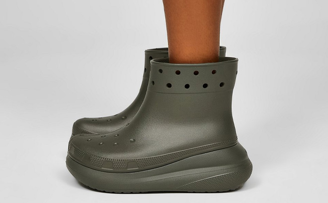 Woman is Wearing Crocs Crush Boots in Dusty Olive Color