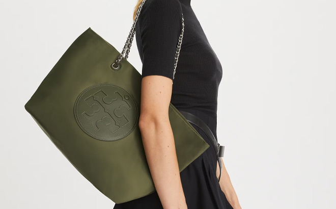 Woman is Wearing Tory Burch Ella Chain Tote in Olive Green Color