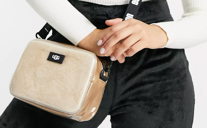 Woman is Wearing UGG Womens Janey II Clear in Natural Color