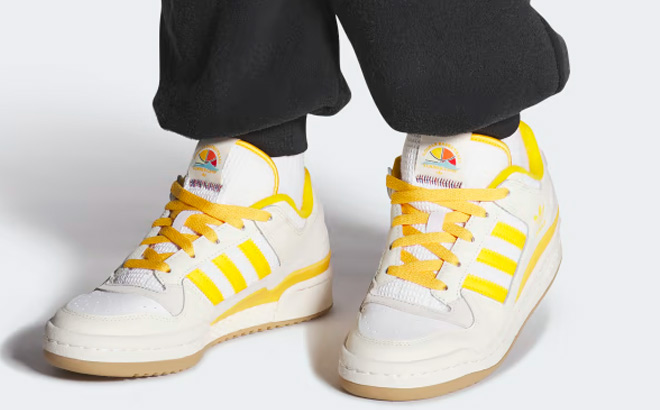 Women Wearing Adidas Forum Low Shoes in Yellow and White