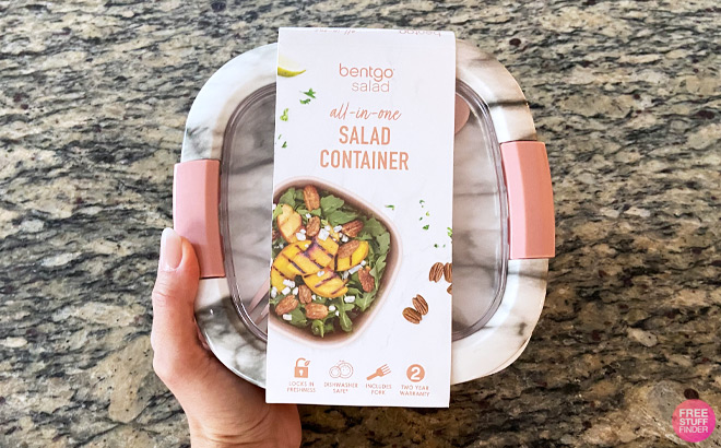 a Hand Holding Bentgo Salad Container