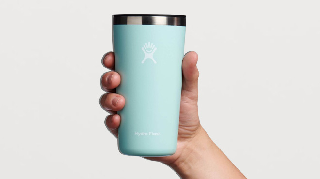 a Hand Holding Hydro Flask Tumbler in Dew Color