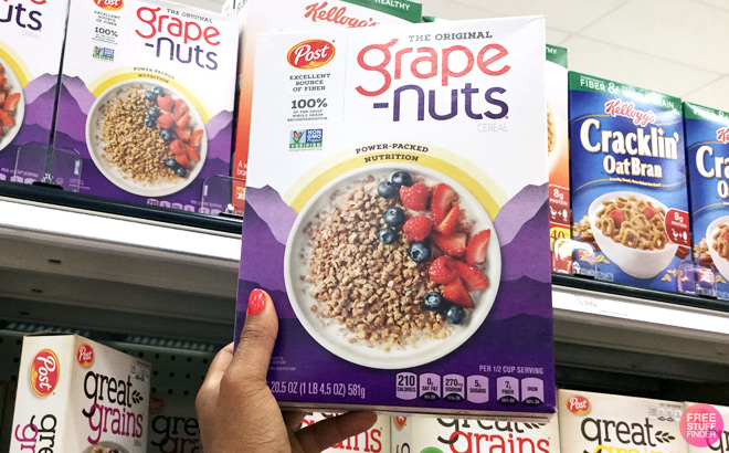 a Hand Holding Post Breakfast Cereal a Hand Holding Post Breakfast Cereal