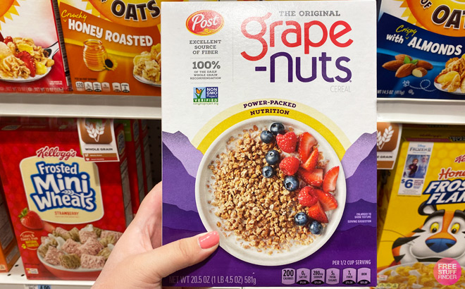 a Hand Holding Post Breakfast Grape Nuts Cereal