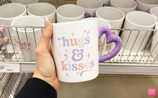 a Hand Holding Valentines Day Hugs Kisses Coffee Mug